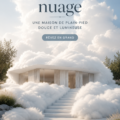 Maison à un étage entourée de verdure, illustrant l'architecture simple et moderne.